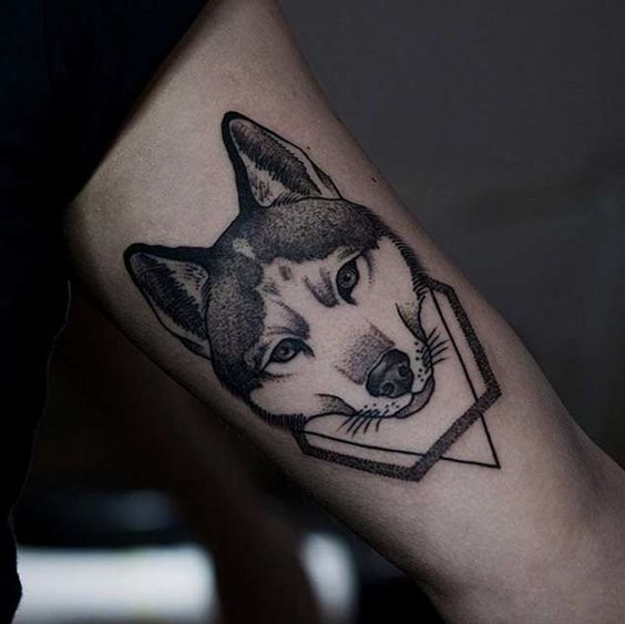 Beautiful geometric husky tattoo design