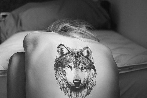 Husky tattoo on back