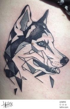 Geometric shaped husky tattoo