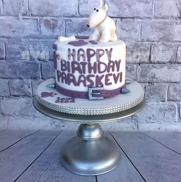 Beautiful white cake in the shape of bull terrier