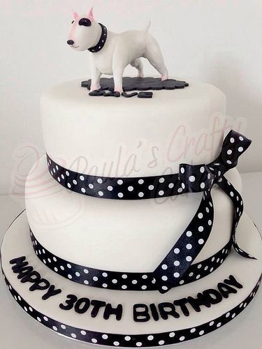 Ribbon cake with a bull terrier figure