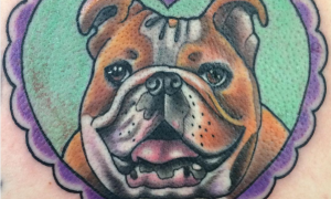 Heart-shaped english bulldog tattoo